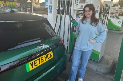 Mini Cooper Electric long termer looking inquisitive with petrol pump