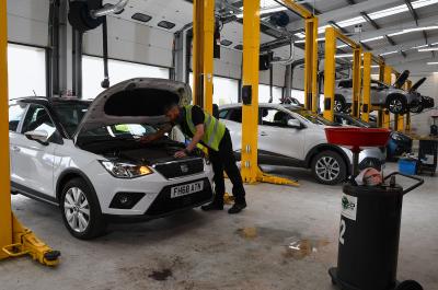 servicing satisfaction: car being serviced