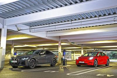 New BMW i4 vs Tesla Model 3 fronts