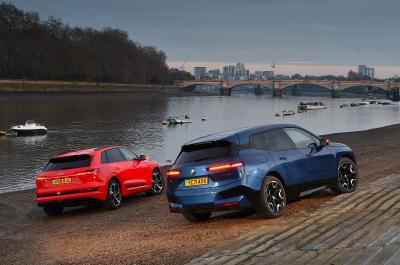 New BMW iX vs Audi E-tron rears