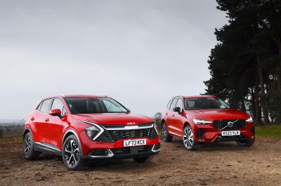 New Kia Sportage vs used Volvo XC60 fronts