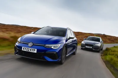 New Volkswagen Golf R Estate vs Cupra Leon Estate fronts