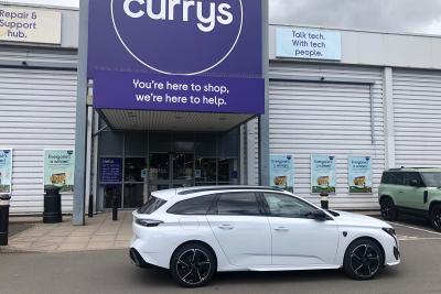 Peugeot e-308 SW outside Currys