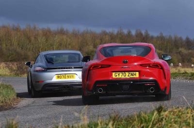 Porsche 718 Cayman vs Toyota GR Supra rears