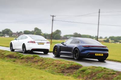 Porsche Taycan and Tesla Model S rear action