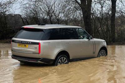 Range Rover wading through river
