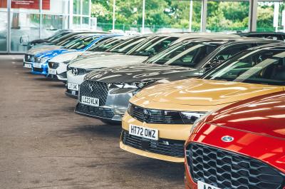 Row of cars at a car dealership