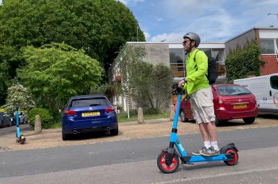 Man riding e-Scooter