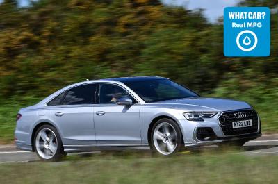 Silver Audi S8 driving with Real MPG logo