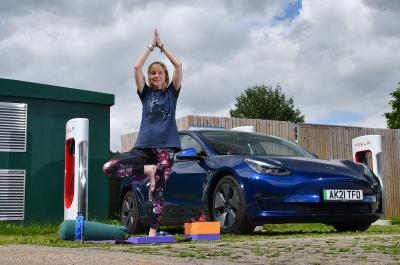 Tesla Model 3 long termer 2021 with Claire doing yoga pose