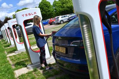 Tesla Model 3 used blue 2021 Claire charging car