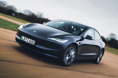 Tesla Model 3 front driving