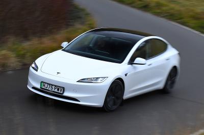 Tesla Model 3 front driving 