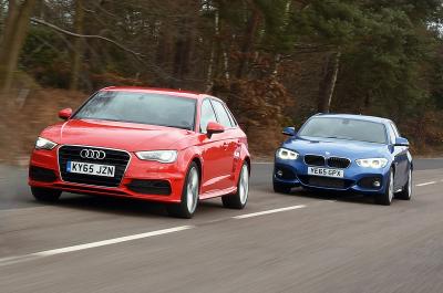 Audi A3 driving in front of BMW 1 Series