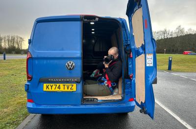 Max in the back of Volkswagen Transporter
