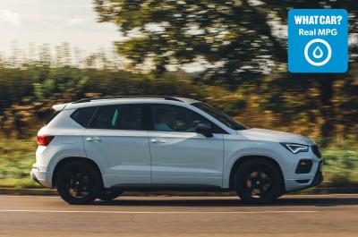 White Seat Ateca driving with Real MPG logo