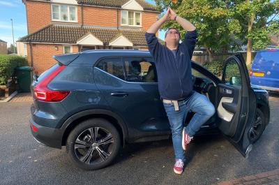 Darren next to Volvo XC40