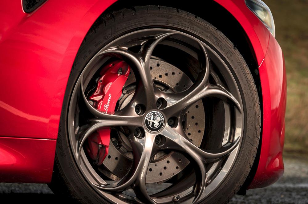 Red Alfa Romeo Giulia Quadrifoglio alloy wheel detail