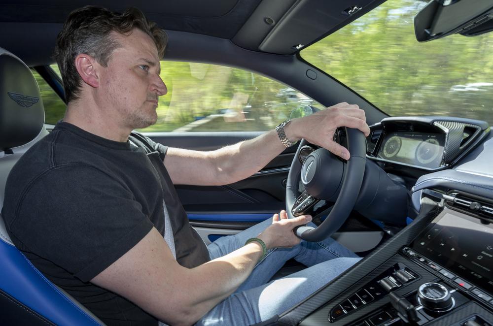 John Howell driving the Aston Martin DB12