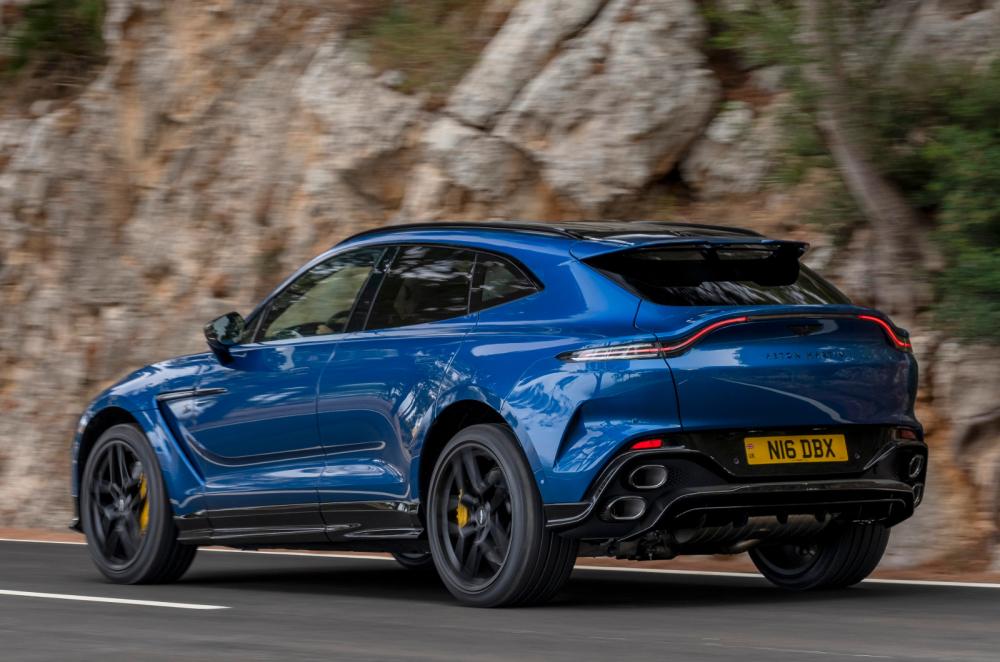 Aston Martin DBX S driving rear left