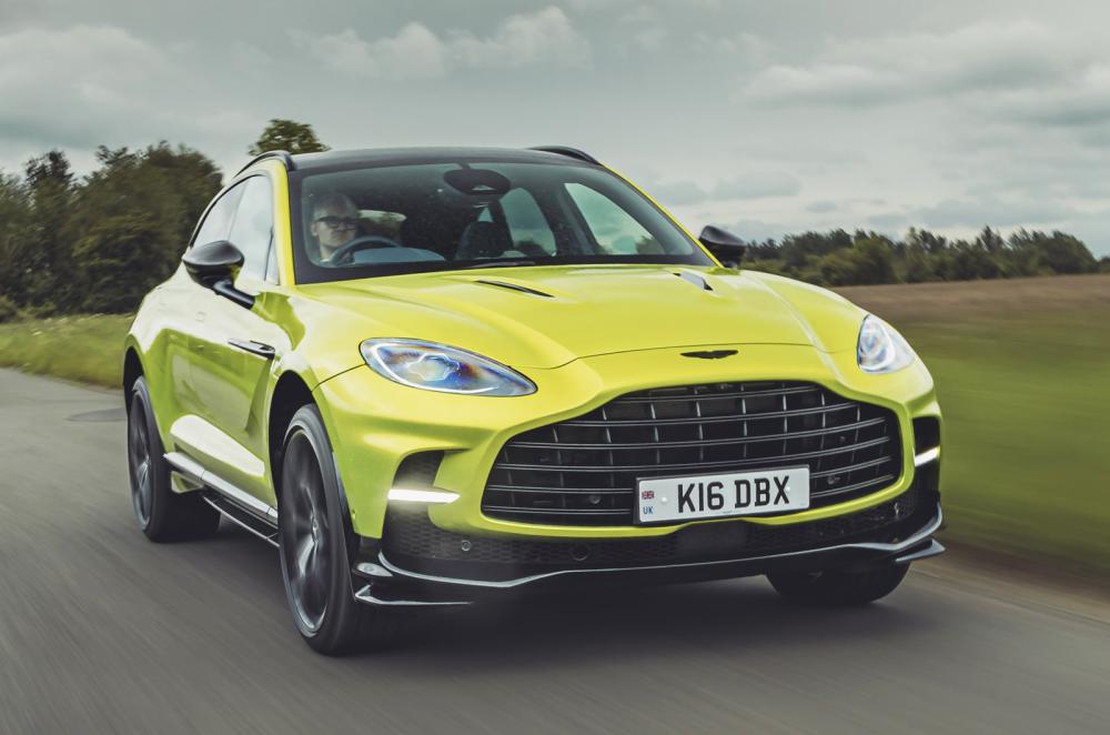 Aston Martin DBX front driving bright green