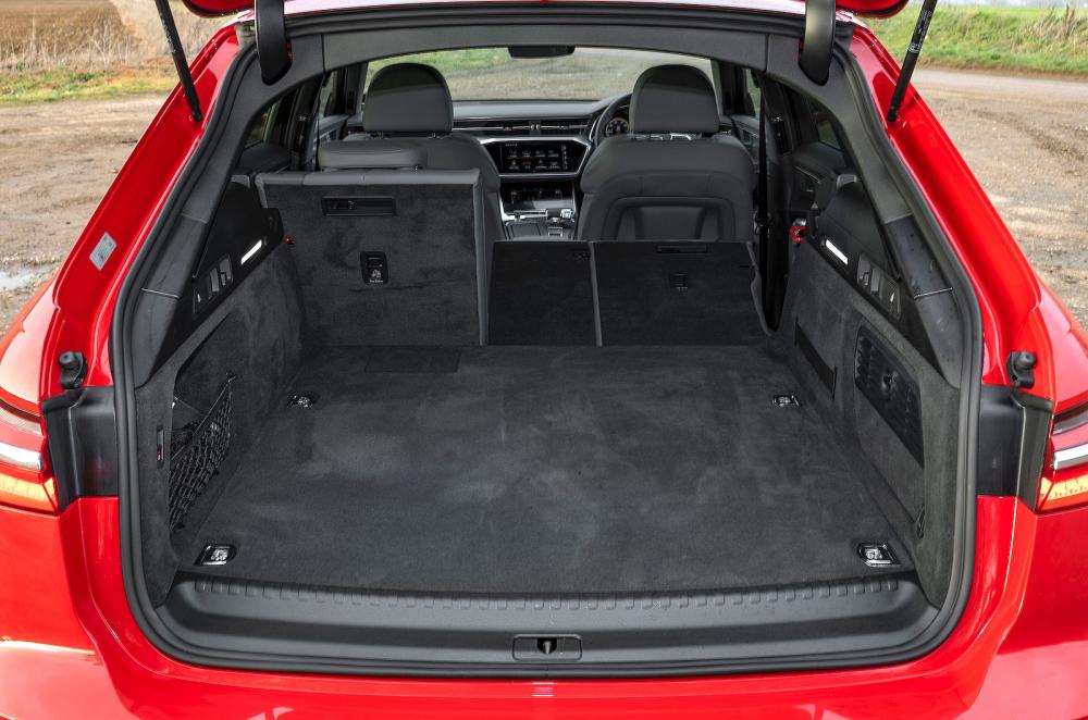 Red Audi A6 Avant boot open