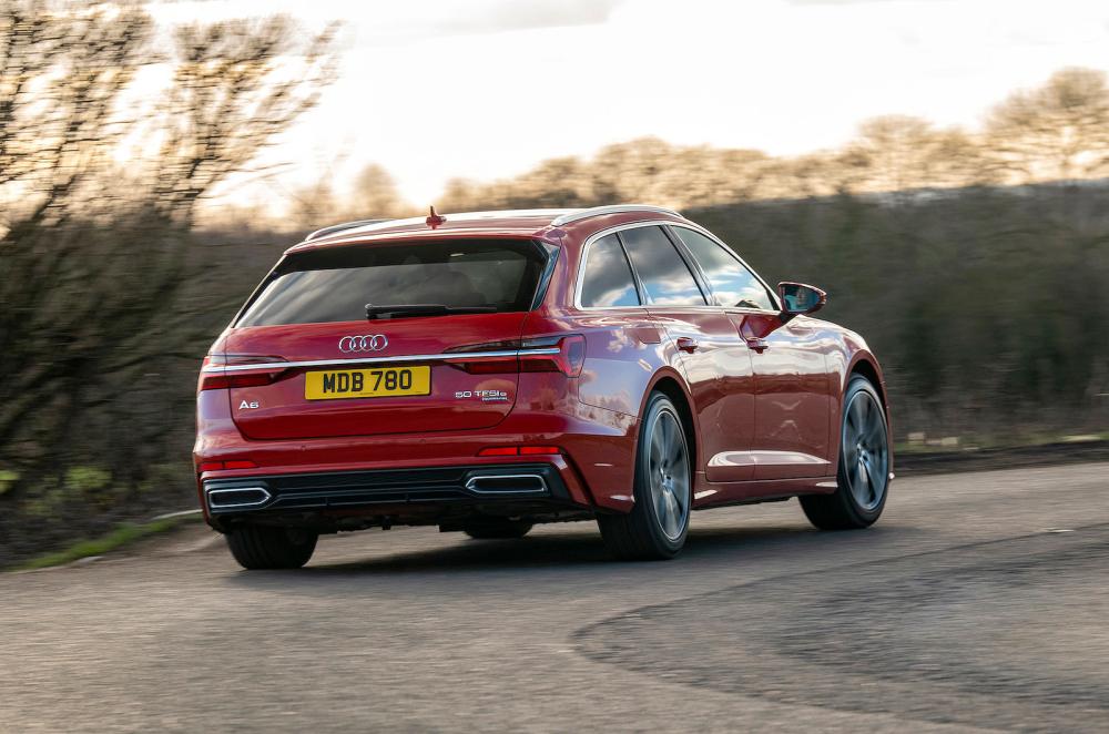 Red Audi A6 Avant rear cornering