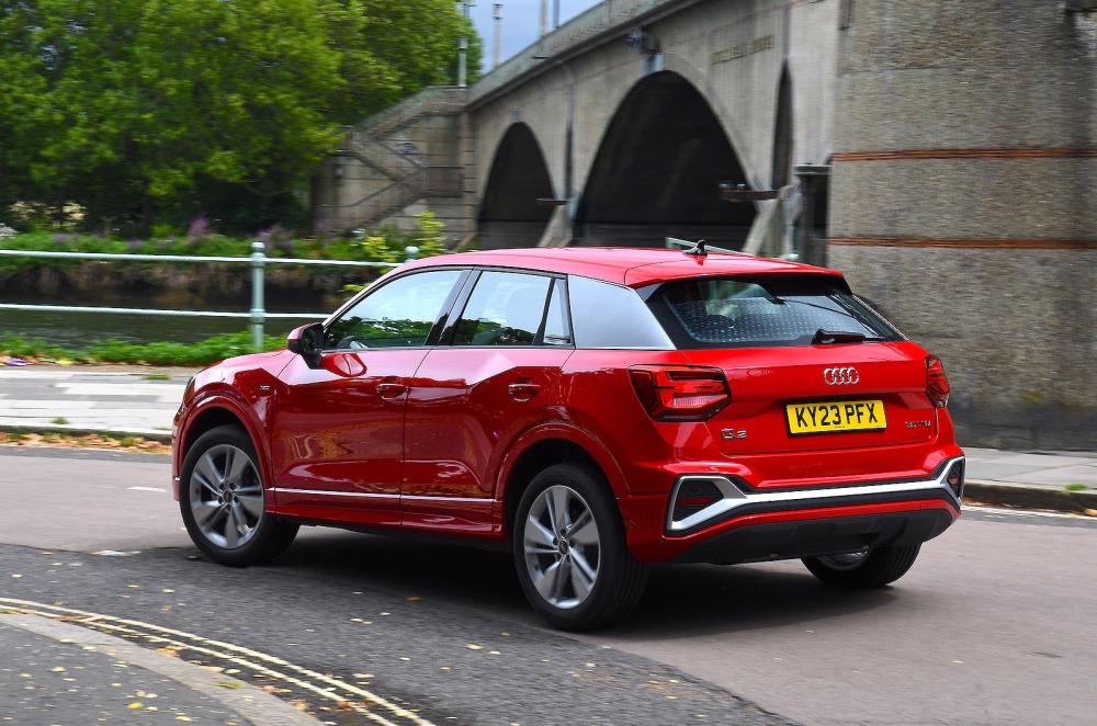 Red Audi Q2 rear cornering