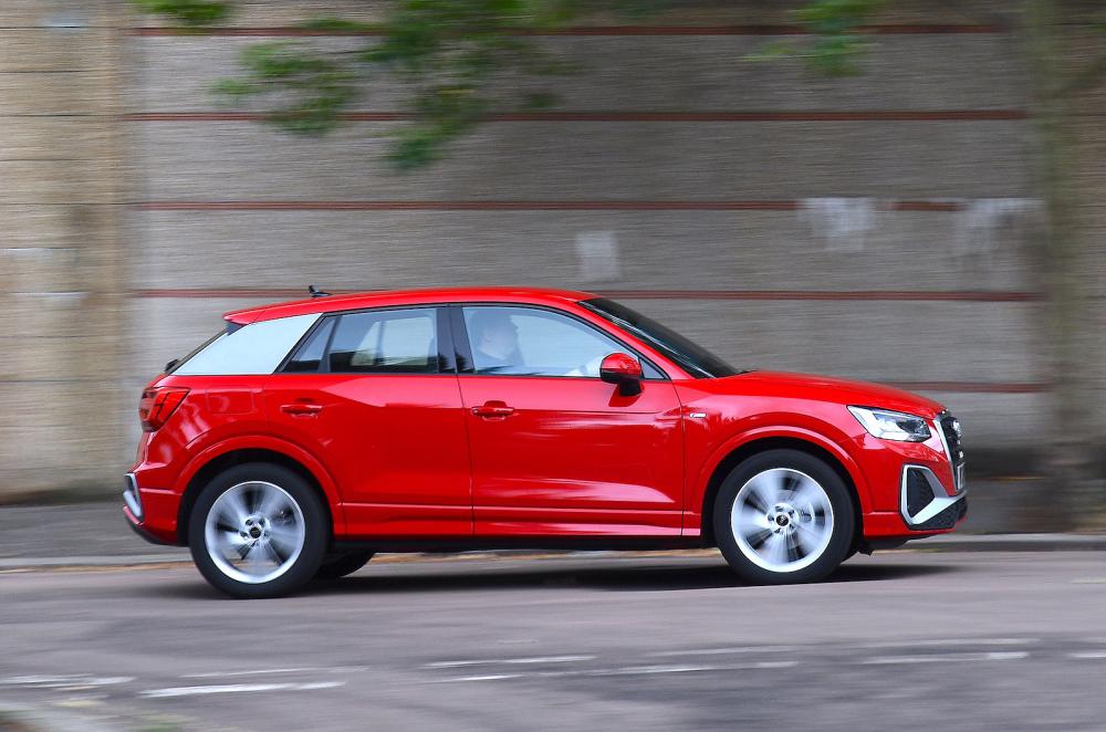 Red Audi Q2 right driving