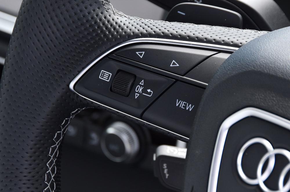 Audi Q3 interior steering wheel detail