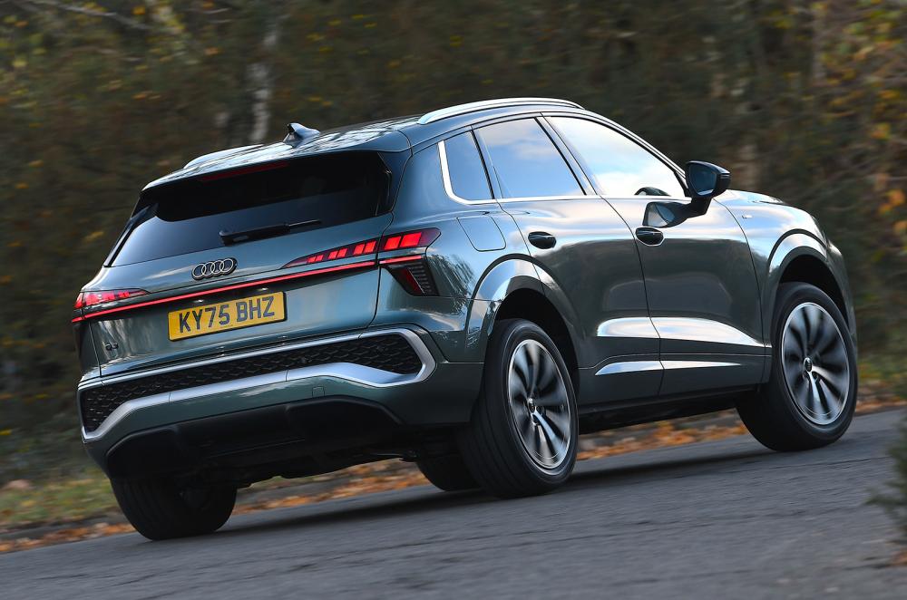 Audi Q3 driving rear right