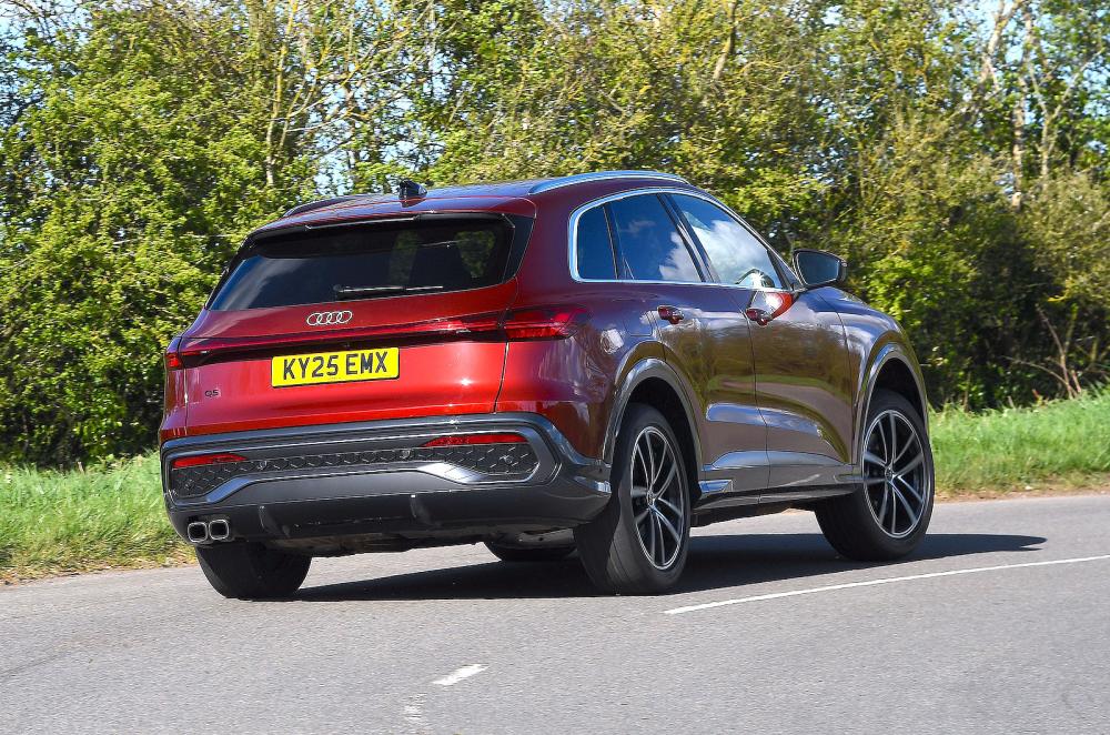 White Audi Q5 rear cornering