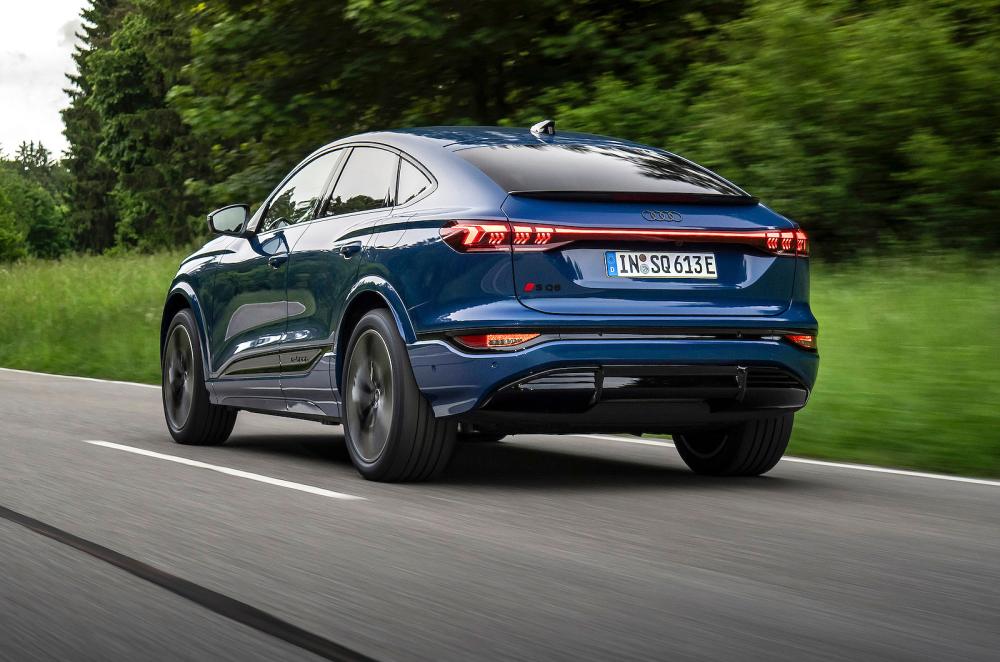 Audi Q6 e-tron Sportback rear left driving