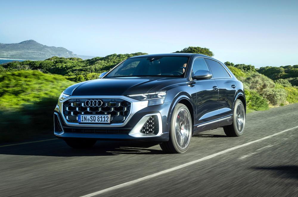 Blue Audi SQ8 front left driving