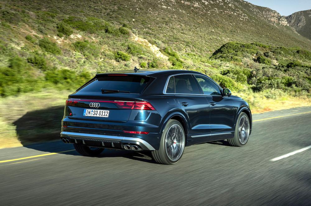 Blue Audi SQ8 rear right driving