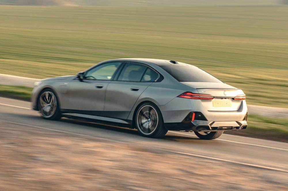 BMW 5 Series rear left driving