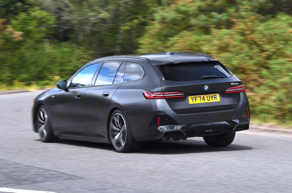 BMW 5 Series Touring rear left driving