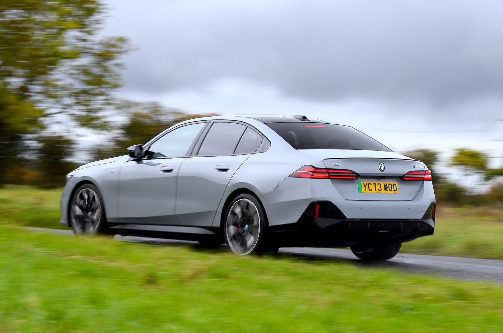 BMW i5 rear left driving
