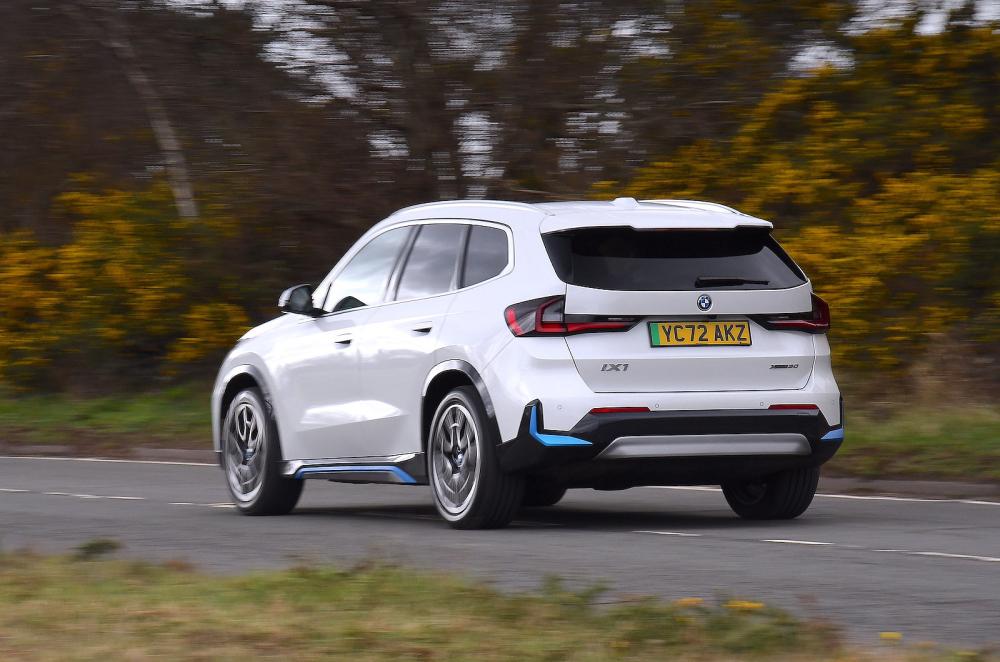 BMW iX1 rear left driving