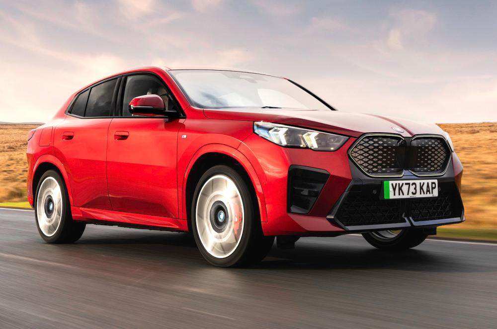 BMW iX2 front right driving