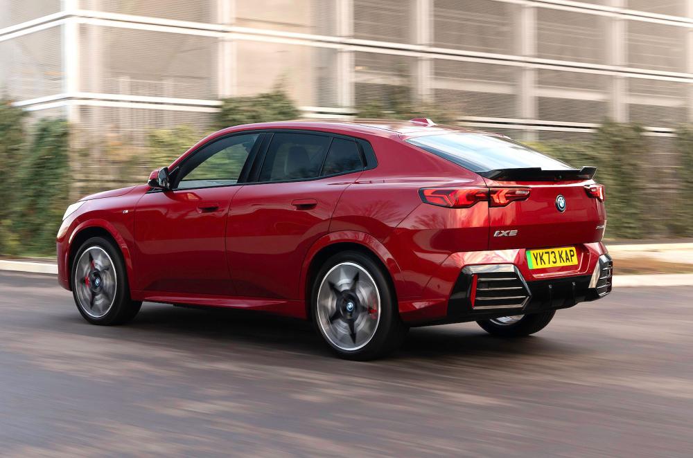 BMW iX2 rear left driving