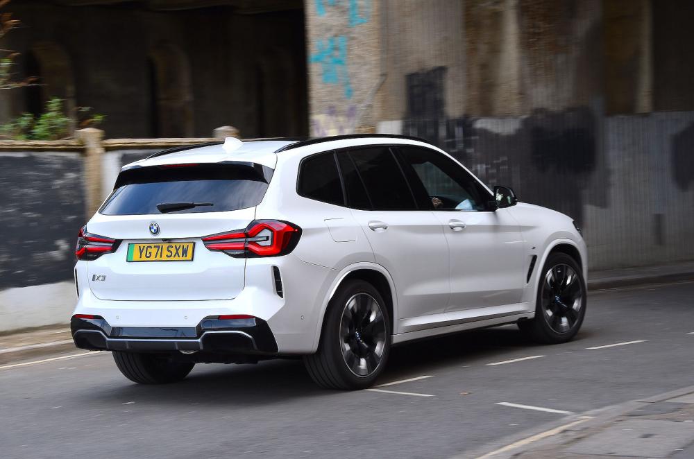 BMW iX3 rear right driving