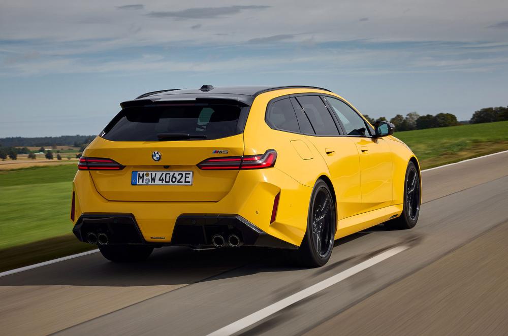 BMW M5 Touring rear right driving