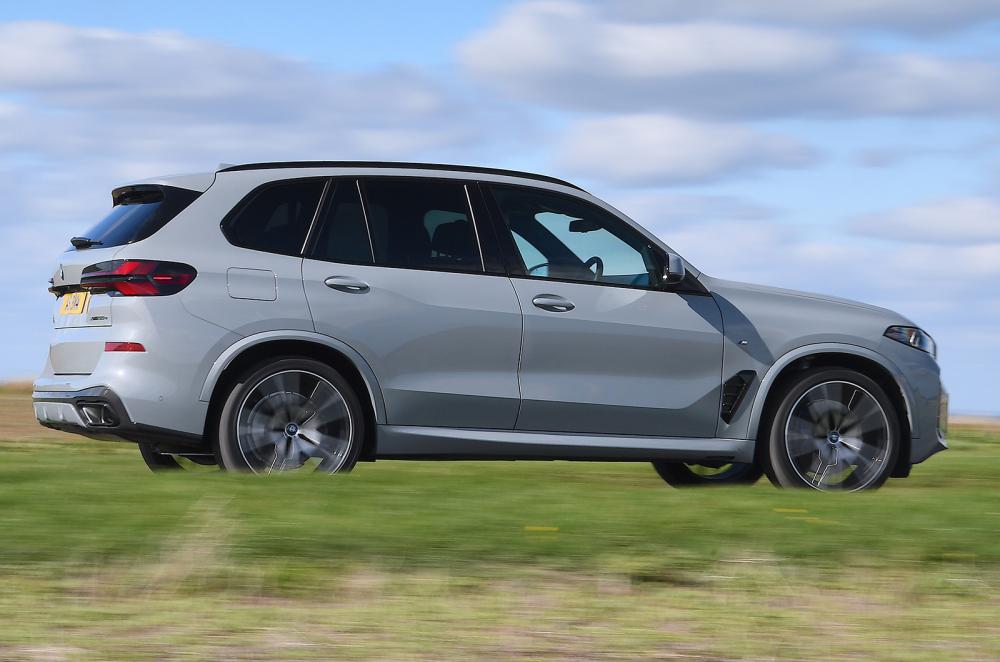 BMW X5 driving rear right