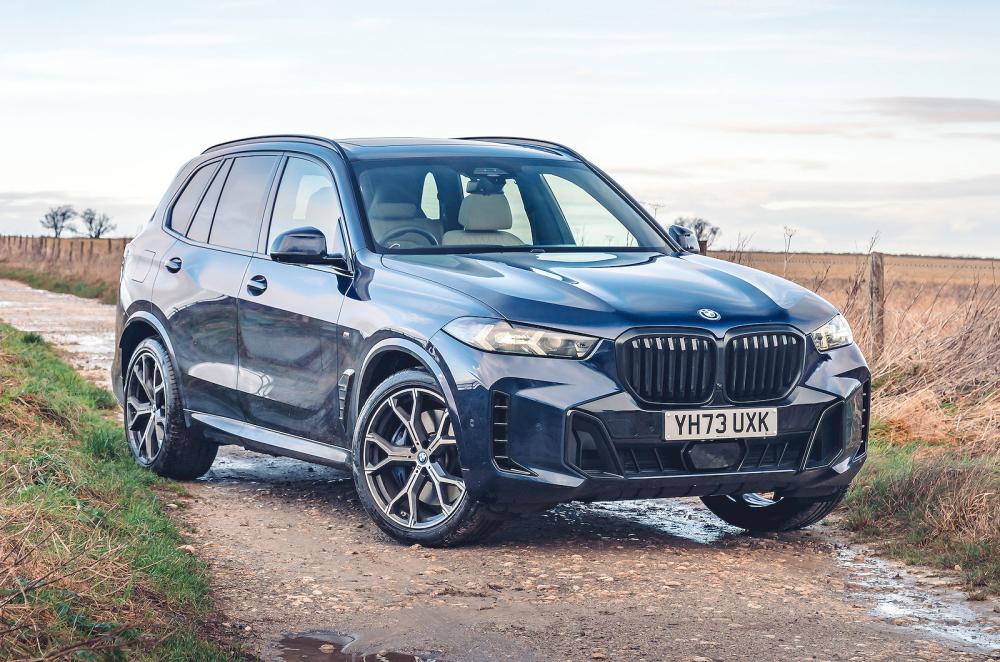 Blue BMW X5 front right static