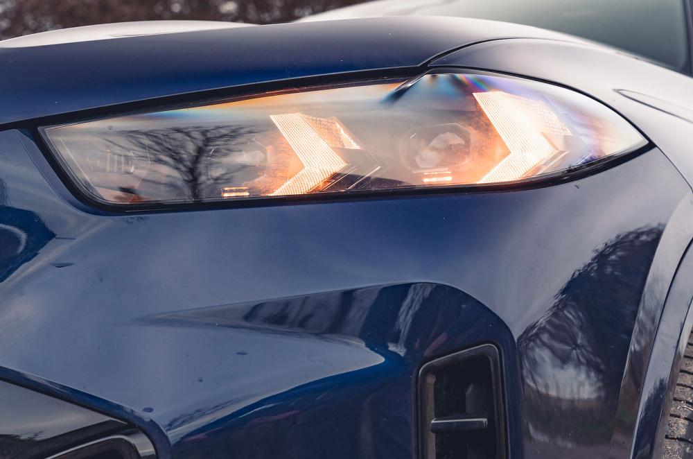 Blue BMW X5 headlights detail