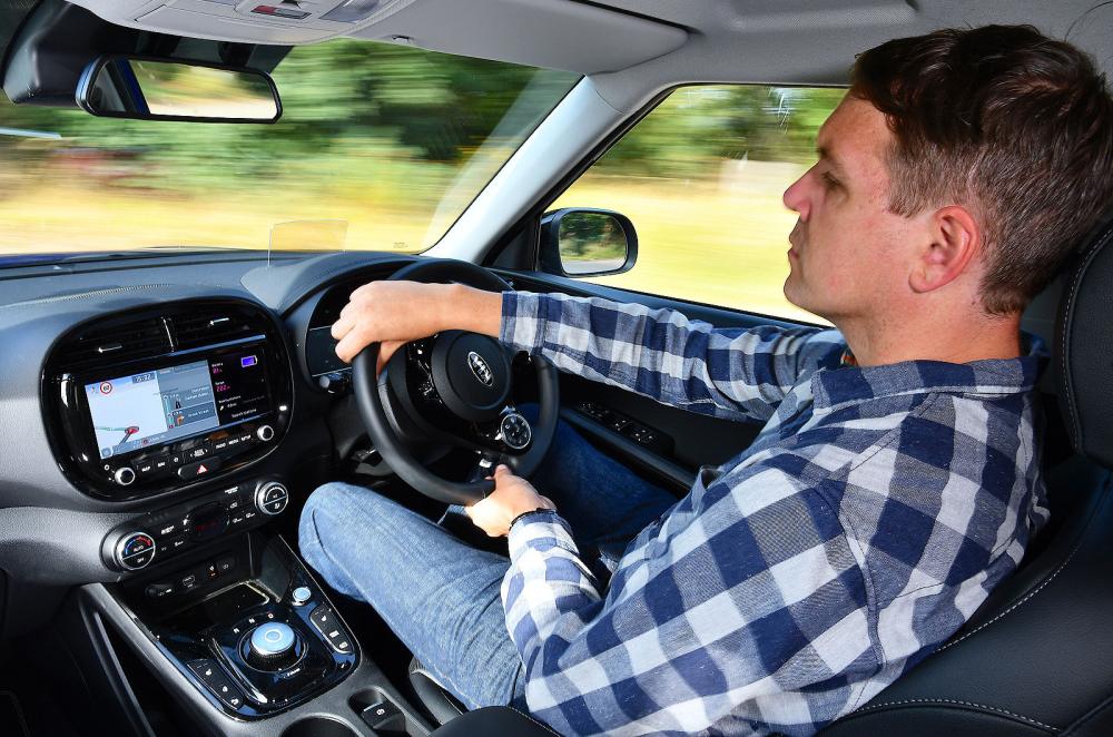 Chris Haining driving Kia Soul EV