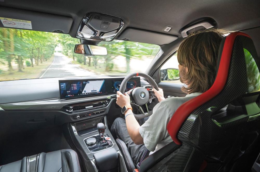 Dan Jones test driving BMW M3 CS Touring