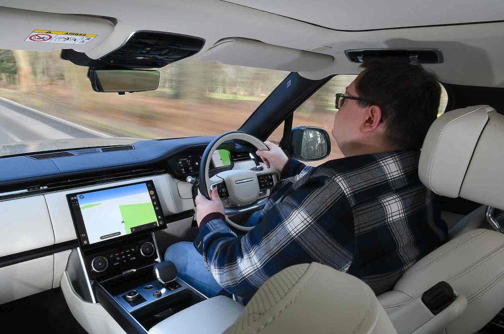 Darren Moss road testing Range Rover