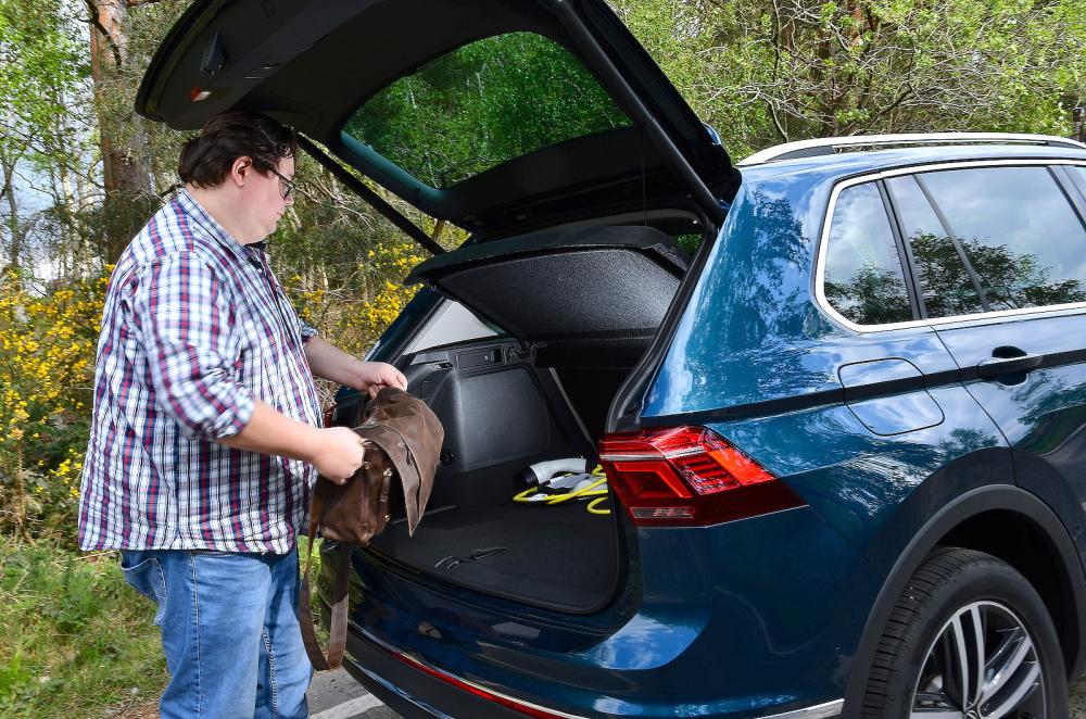 Darren Moss loading VW Tiguan boot